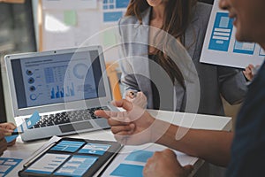 Close up ux developer and ui designer use augmented reality brainstorming about mobile app interface wireframe design on desk at
