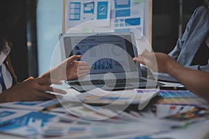 Close up ux developer and ui designer use augmented reality brainstorming about mobile app interface wireframe design on desk at
