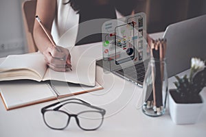 A close-up of an ux ui developer and an ui designer working on a mockup icon interface for a mobile app.