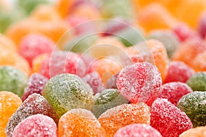 Close up of a variety of mint jelly bonbons with sugar crystals icing in different flavors and colors