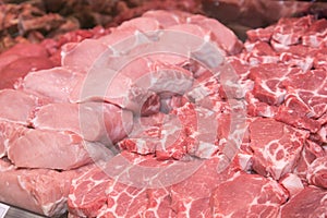 Close up of various meat in a supermarket. Raw meat at butcher shop