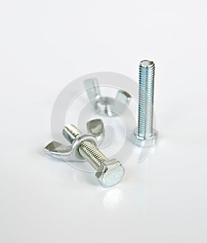 Close-up of various steel nuts and bolts