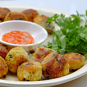 Close up vegan food, fried tofu ball in yellow for vegetarian meal