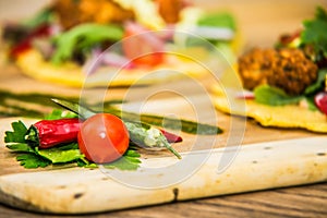 Close-up of a vegetable side dish on a wooden trayl