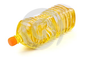 close up vegetable or sunflower oil in plastic bottle isolated on white