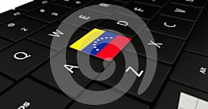 Close up of Venezuela button.
