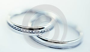 Close up of very expensive wedding rings for newlyweds, wedding concept, macro image