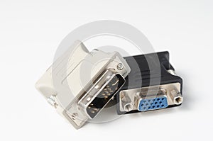 Close-up of     vga and dvi adapters  used for   pc   to monitor  connection   on white  background