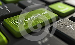 Close up of a vibrant green Contact us! key on a computer keyboard, symbolizing customer service support, digital