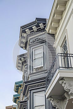 Close-up of victorian style homes with decorative brackets in San Francisco, California