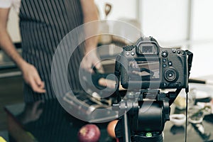 Close up of a video camera filming