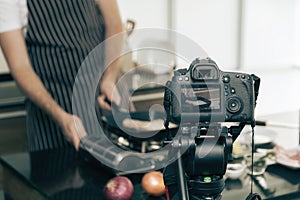 Close up of a video camera filming