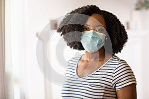 Close up view of an African American woman wearing a face mask
