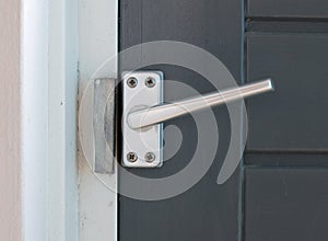 Close up view of aluminum door window handle