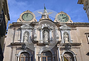 Close-up view of ancient clock tower in Trapani. Ancient building in historical part of Trapani, Sicily, Italy