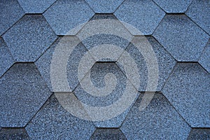 Close up view on asphalt roofing shingles.