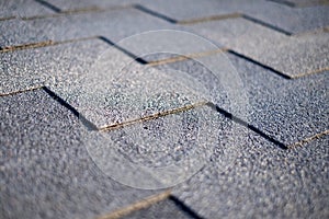 Close up view on Asphalt Roofing Shingles Background. Roof Shingles - Roofing