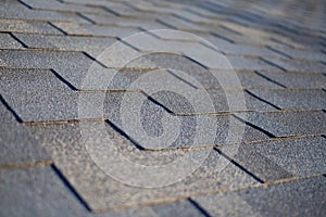 Close up view on Asphalt Roofing Shingles Background. Roof Shingles - Roofing