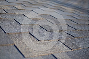 Close up view on Asphalt Roofing Shingles Background. Roof Shingles - Roofing photo