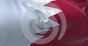 Close-up view of the Bahrain national flag waving in the wind