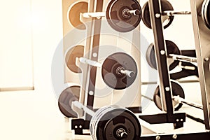 Close up view of barbell on floor in gym