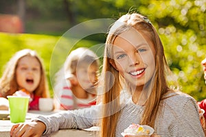 Close up view of beautiful girl with cupcake
