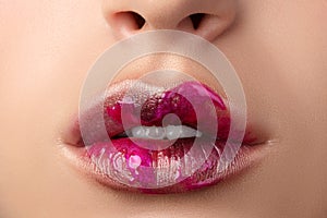 Close up view of beautiful woman lips with modern fashion make u