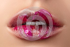 Close up view of beautiful woman lips with modern fashion make u