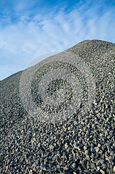 Close up view on big pile of gray gravel