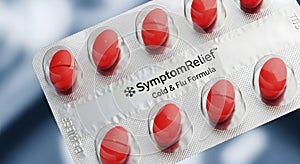 Blister pack of red cold and flu medication capsules