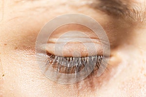 close up view of a closed eye