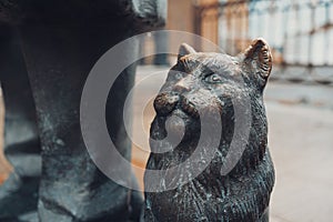 Close up view of bronze cat statue