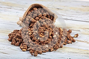 Close-up view of brown colored peanuts and peanut collection. Concept groundnuts and Sesame, Sesame seeds