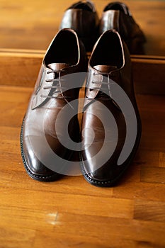 Close-up view of the brown men`s shoes for a business meeting