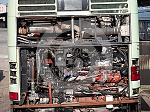 Close-up View of a Bus Engine with the Hood Raised