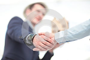 Close up view of business partnership handshake concept.Photo of two businessman handshaking process.Successful deal