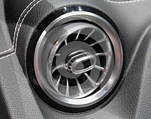 A macro close up view of car air vent photo
