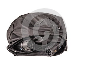 Close up view of charging cable for charging a BMW electric car in black bag isolated on white background.