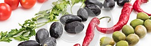 Close up view of cherry tomatoes, parsley, olives, chili pepper on white background, panoramic shot.