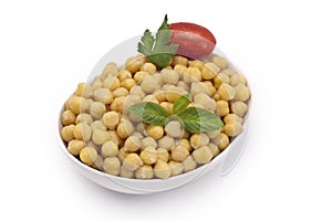 Close up view of chickpea in bowl on white backgro