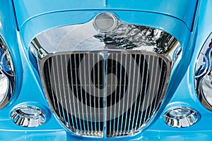 Close up view of chrome grille of exclusive vintage car, replica on the famous convertible car in French Riviera, Cap