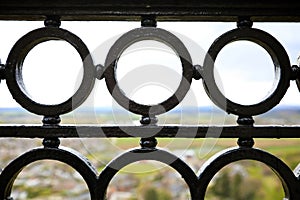Close up view of circular shaped iron railings