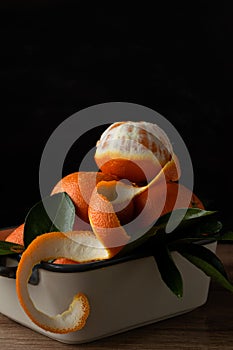 Close up view of citrus fruits on black background. Oranges vitaminic