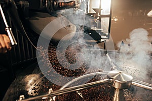close up view of coffee beans roasting