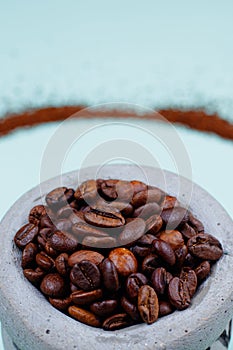 Close up view of Coffee on stone Mortar photo