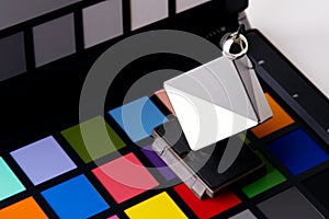 Close up view of color checker equipment of professional photographer