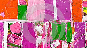 Close-up view of a colorful abstract painting with bold acrylic strokes
