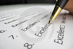 Close-up view of completing an evaluation form