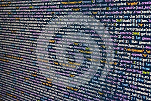 Close-up view of a complex code on a computer screen, emphasizing the intricate nature of digital coding work