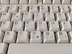 A close-up view of the computer peripheral or hardware, detail from the keyboard, letters and numbers on the buttons, qwertz